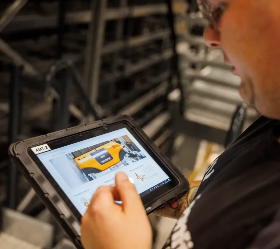 technician-monitoring-warehouse-automation-system