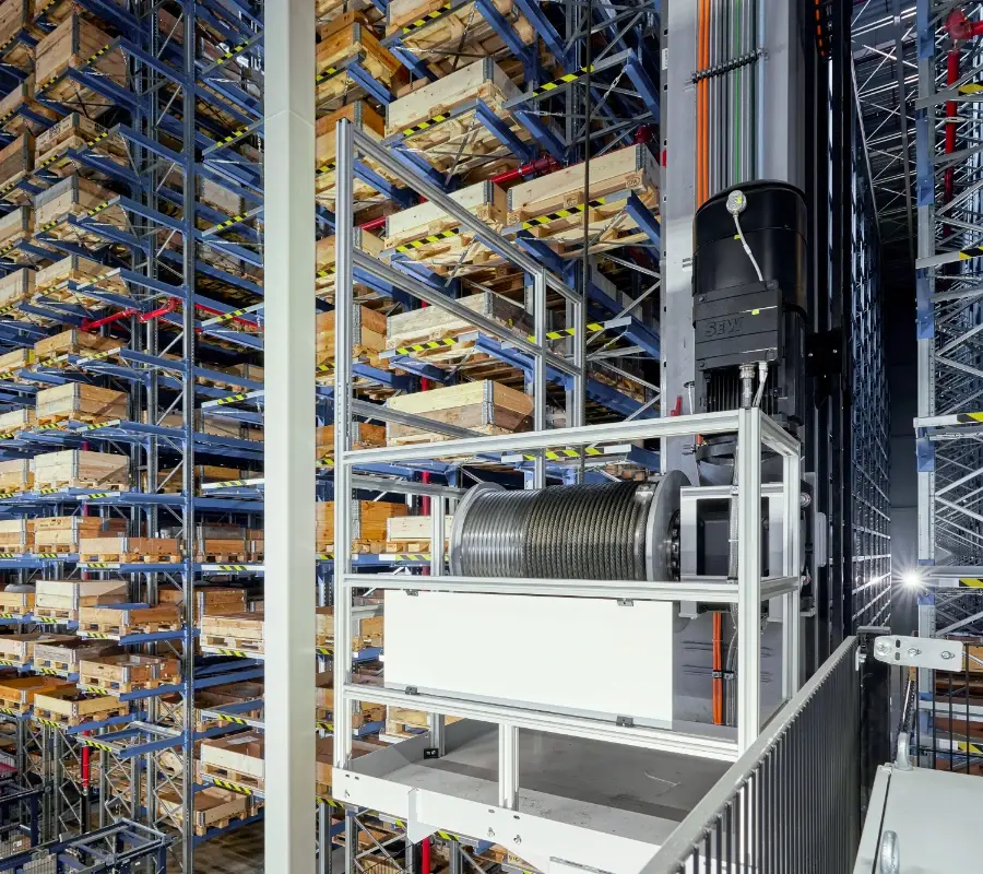 Automated storage and retrieval system (ASRS) with high-density warehouse racking and pallet lift mechanism.